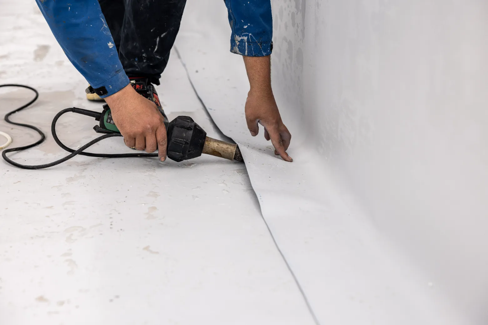 Waterproofing the basement floor.